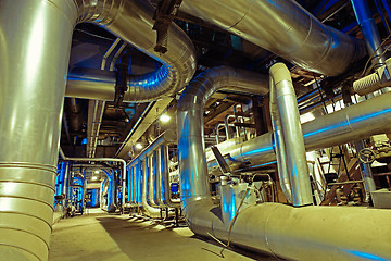 Image showing Equipment, cables and piping as found inside of a modern industr