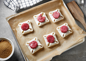 Image showing raw sweet buns on baking pan