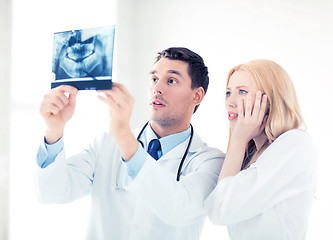 Image showing two doctors looking at x-ray