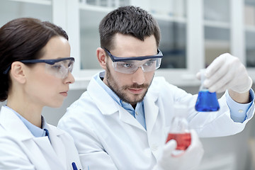 Image showing young scientists making test or research in lab