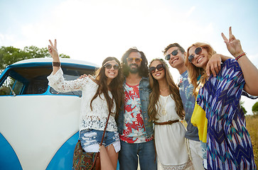 Image showing hippie friends over minivan car showing peace sign
