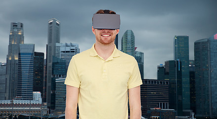 Image showing happy man in virtual reality headset or 3d glasses