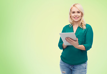 Image showing smiling woman with tablet pc computer