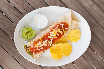 Image showing Traditional mexican tortilla wrap on plate