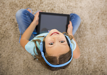 Image showing Girl listen music