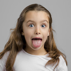 Image showing Girl with tongue out