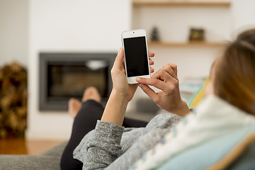 Image showing Woman texting