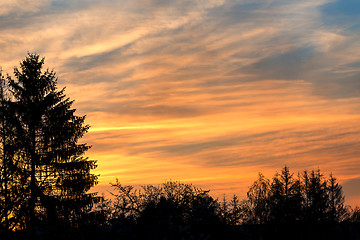 Image showing sunset with orange sky and clouds