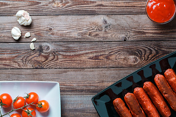 Image showing Sausage roasted on the grill.