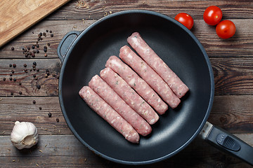 Image showing Raw Sausages in a Pan