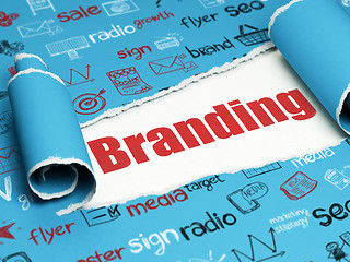 Image showing Marketing concept: red text Branding under the piece of  torn paper