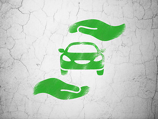 Image showing Insurance concept: Car And Palm on wall background