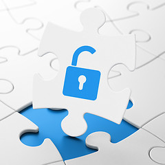 Image showing Privacy concept: Opened Padlock on puzzle background