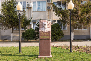 Image showing Sennoy, Russia - March 15, 2016: Monument to Memory Maltabar Leonid Markovich installed before running wine fanagoria plant, village Sennoy, Mira Street 49