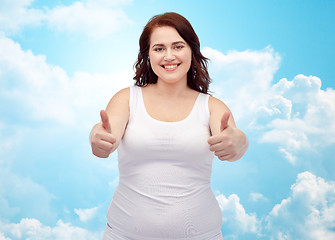 Image showing plus size woman in underwear showing thumbs up