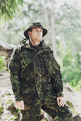 Image showing young soldier or ranger in forest