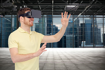 Image showing happy man in virtual reality headset or 3d glasses