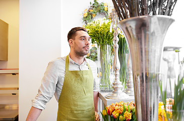 Image showing florist man or seller at flower shop