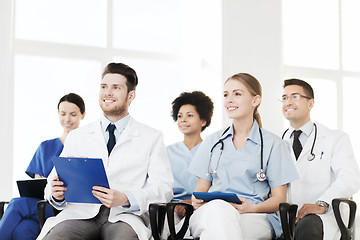 Image showing group of happy doctors on seminar at hospital