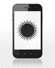 Image showing Vacation concept: Smartphone with Sun on display