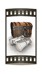 Image showing binoculars and chest. The film strip