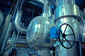 Image showing Equipment, cables and piping as found inside of a modern industr