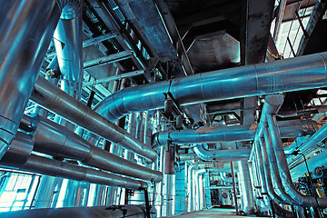 Image showing Equipment, cables and piping as found inside of a modern industrial power plant