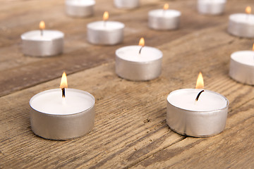 Image showing Candles on wooden background