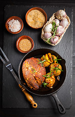 Image showing Pulled pork dish with backed rustic potates