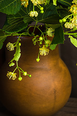 Image showing Jar with lime honey on a table, \rClose up