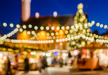 Image showing Decorated Christmas market. Abstract blurred lights background