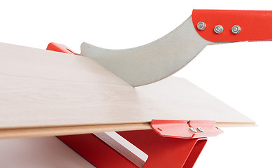 Image showing Red tool for cutting laminate