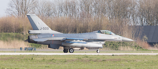 Image showing LEEUWARDEN, NETHERLANDS - APRIL 11, 2016: A dutch F-16 on the gr