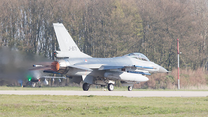 Image showing LEEUWARDEN, NETHERLANDS - APRIL 11, 2016: A dutch F-16 on the gr