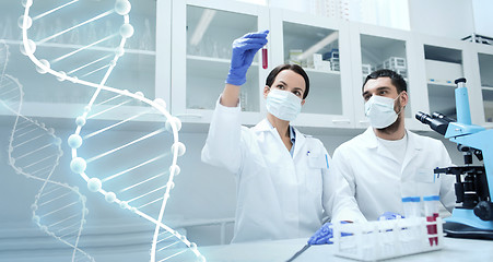 Image showing young scientists making test or research in lab