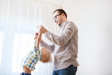 Image showing father with son playing and having fun at home