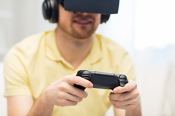 Image showing close up of man in virtual reality headset playing