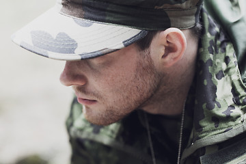 Image showing close up of young soldier in military uniform