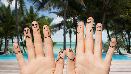 Image showing close up of hands and fingers with smiley faces