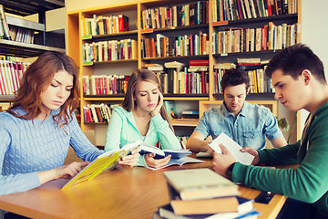 Image showing students reading books in library