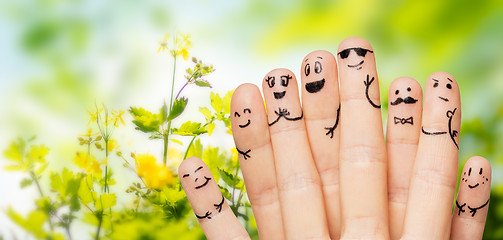 Image showing close up of hands and fingers with smiley faces