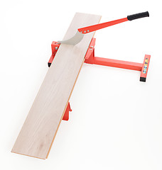 Image showing Red tool for cutting laminate