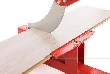 Image showing Red tool for cutting laminate