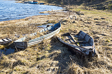 Image showing Old fishing boats on lake coast