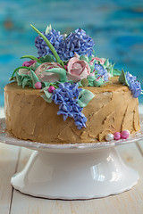 Image showing Coffee cake with floral decoration.