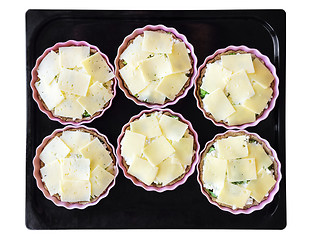 Image showing Cheese and broccoli pies on a baking tray