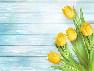 Image showing Yellow tulips flowers on wooden planks. EPS 10