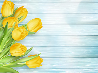 Image showing Yellow tulips flowers on wooden planks. EPS 10