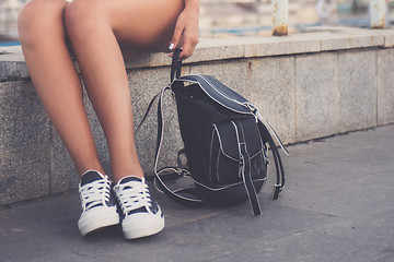 Image showing closeup of woman legs in white gumshoes