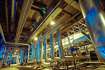 Image showing Equipment, cables and piping as found inside of a modern industr